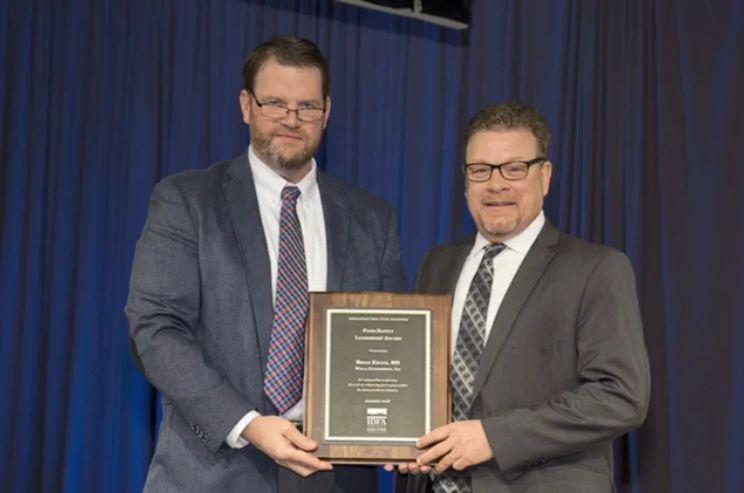 Brian Kraus receives recognition for food safety management